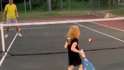 Young tennis fan is supremely proud of herself for playing 'like a big girl'