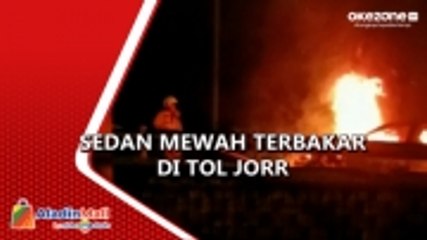 Скачать видео: Sedan Mewah Terbakar di Ruas Tol JORR