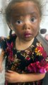 Little girl makes herself beautiful with mommy's makeup