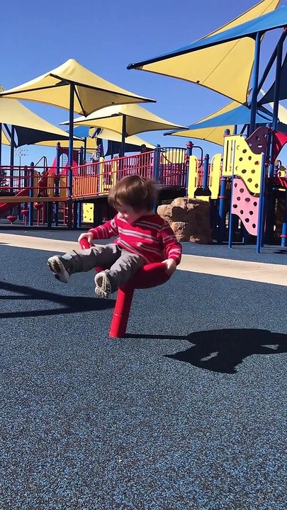 Spinning Toddler Takes A Tumble
