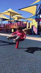 Spinning Toddler Takes A Tumble