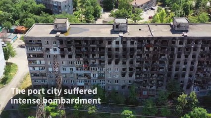 Putin visits Mariupol in first trip to captured territory