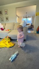 Little Girl Wears Mom's Slippers