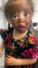 Little girl makes herself ''beautiful'' with mommy's makeup