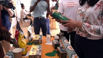 Home secretary visits market and cricket match in Rwanda