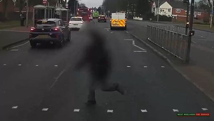 Young person narrowly avoids being hit by fire engine