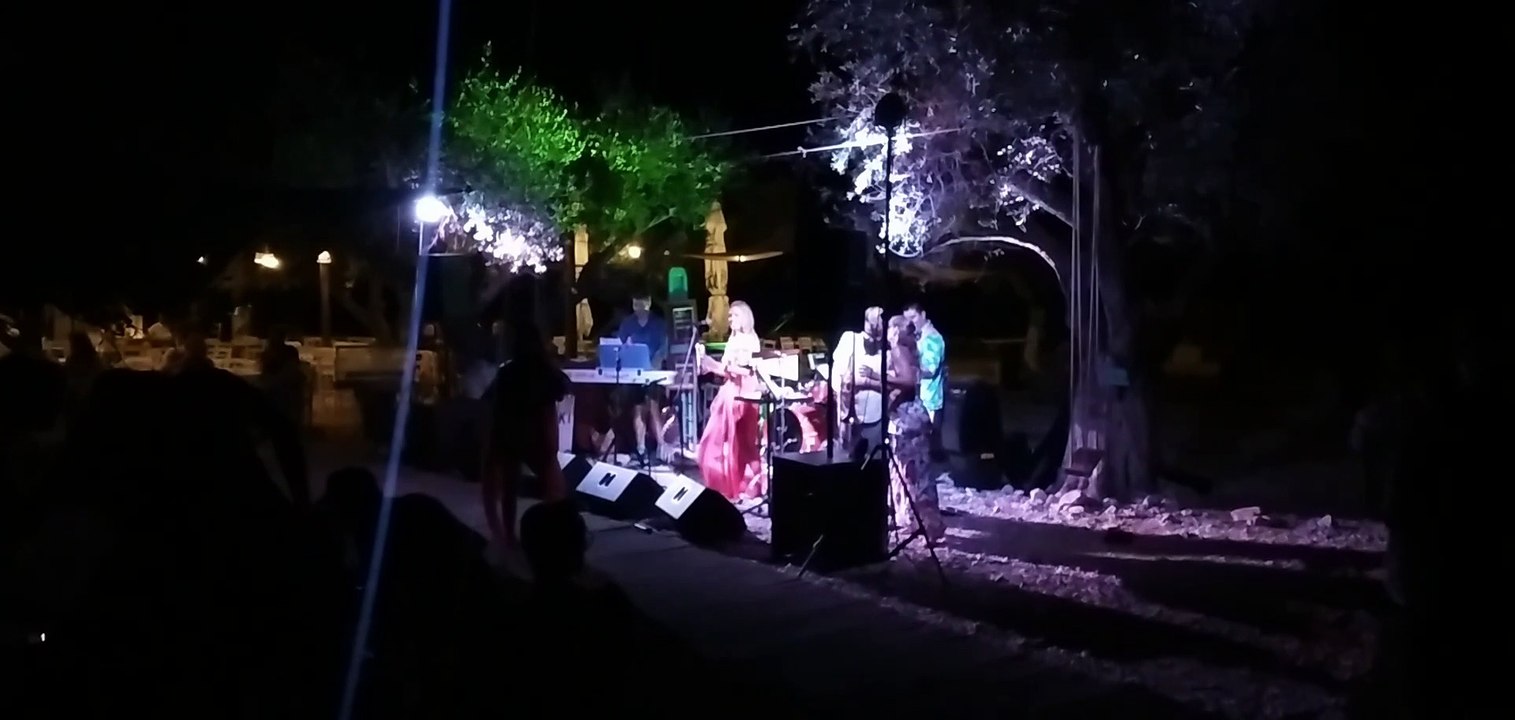 summer 2022, ithaca ,  beach filiatro , listening to cubaneros and admiring the power of nature