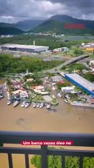 Moradora flagra mancha de óleo no rio Camboriú