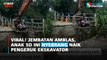 Viral! Jembatan Amblas, Anak SD ini Nyebrang Naik Pengeruk Ekskavator