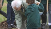 David Attenborough plants tree in honour of Queen Elizabeth