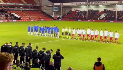 Gyabi and Perkins sing the national anthem