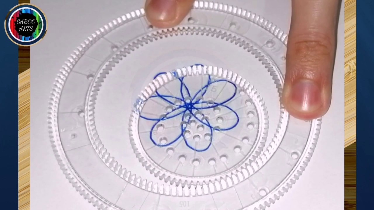 DIBUJANDO una flor azul. (ESPIROGRAFO)