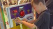 Boy wins big in the arcade by feeding the ticket machine over 2,000 tickets