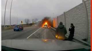 Police Officer and Dog Flee as Car Catches Fire