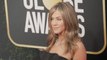 Jennifer Aniston s Colorful Ruched Halter Dress Is Putting Us in the Summer Mindset