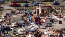 Families trapped in debris after Mississippi tornado