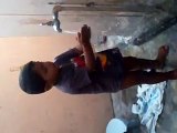 A small kid is washing the cloths(funny video)