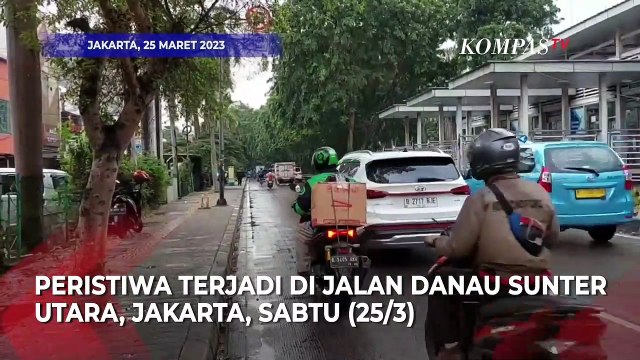 Detik-detik Pengemudi Ojol Nyaris Terlindas Truk Usai Berkendara Sambil Main HP