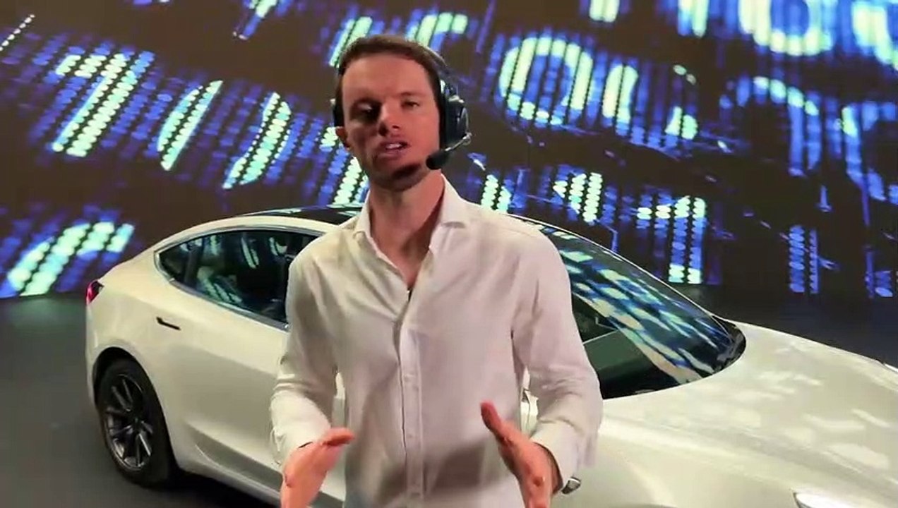 Driving A Tesla Upside-Down (10ft Tall Wheels)