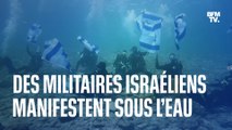 Des militaires israéliens manifestent sous l’eau contre la réforme de la justice