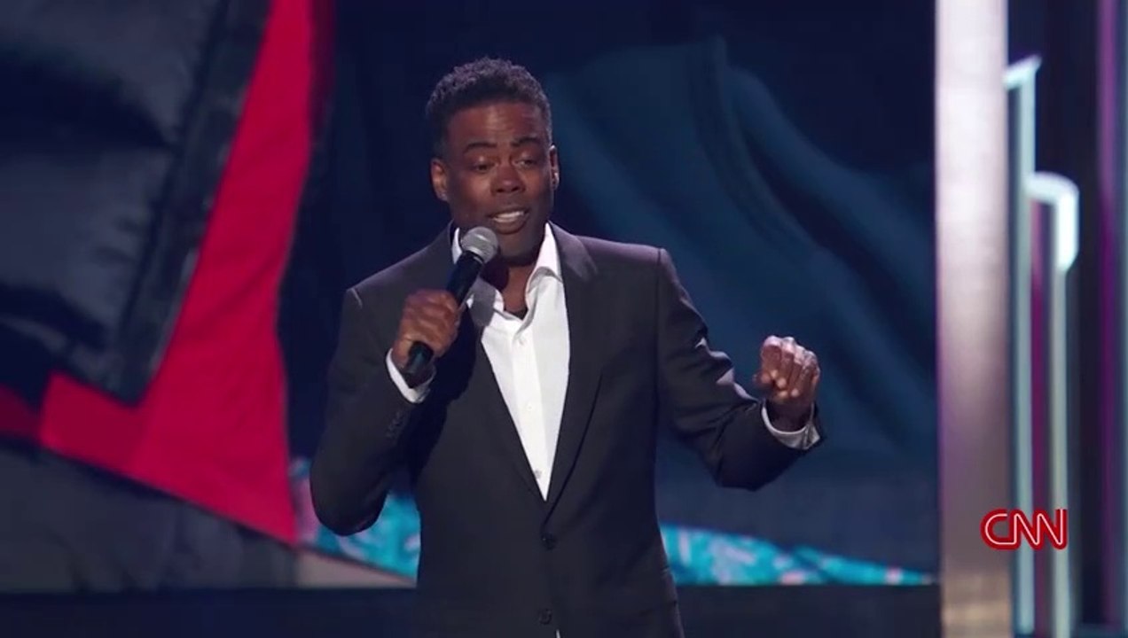 chris-rock-jokes-about-the-oscars-slap-in-tribute-to-adam-sandler