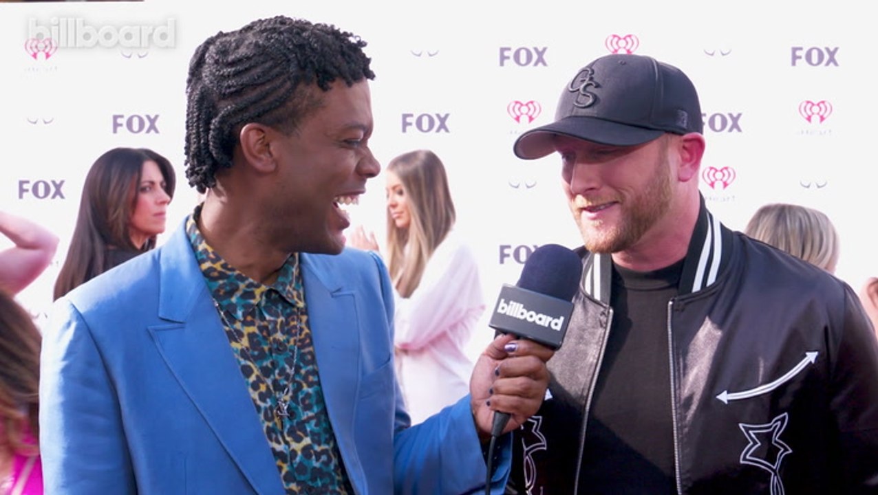 Cole Swindell Talks Creating A "Fun Breakup Song" in 'Drinkaby', Releasing a Deluxe Version of His Album 'Stereotype' & More | iHeart Radio Music Awards 2023