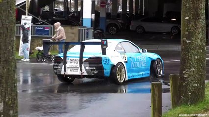 Tuner cars leaving a carshow in the RAIN Heaven On Wheels 2023