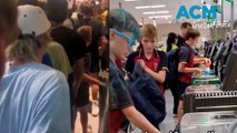 Wild scenes as young shoppers storm Woolworths for Prime energy drink
