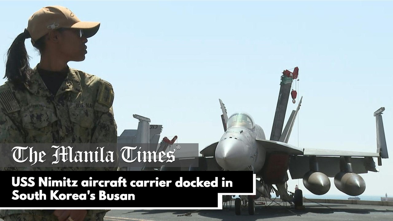 USS Nimitz aircraft carrier docked in South Kor...
