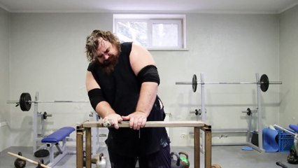 Karate Chopping A Board With Nails