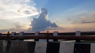 View of amazing clouds from the bridge over River Ganga