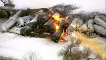Train wreck engulfed by flames after 22-carriage derailment in Minnesota