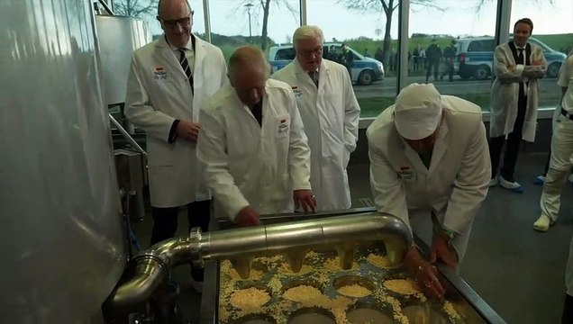 King of cheeses: Charles takes part in dairy production at farm