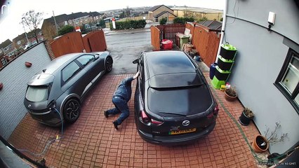 Man Trips Over Electric Car Charger