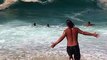 Large Waves Wash Over Beachgoers in Brazil