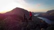 Drone footage shows boyfriend pulling off “ultimate proposal” atop a mountain
