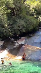 Woman Rides Down Waterfall and Hits People Sitting Below
