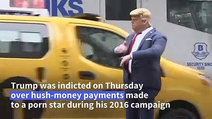 'It's about time': Americans react to Trump indictment in New York