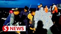 Stranded at sea: 11 saved after three day ordeal on capsized boat near Sandakan