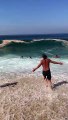 Large Waves Wash Over Beachgoers in Brazil