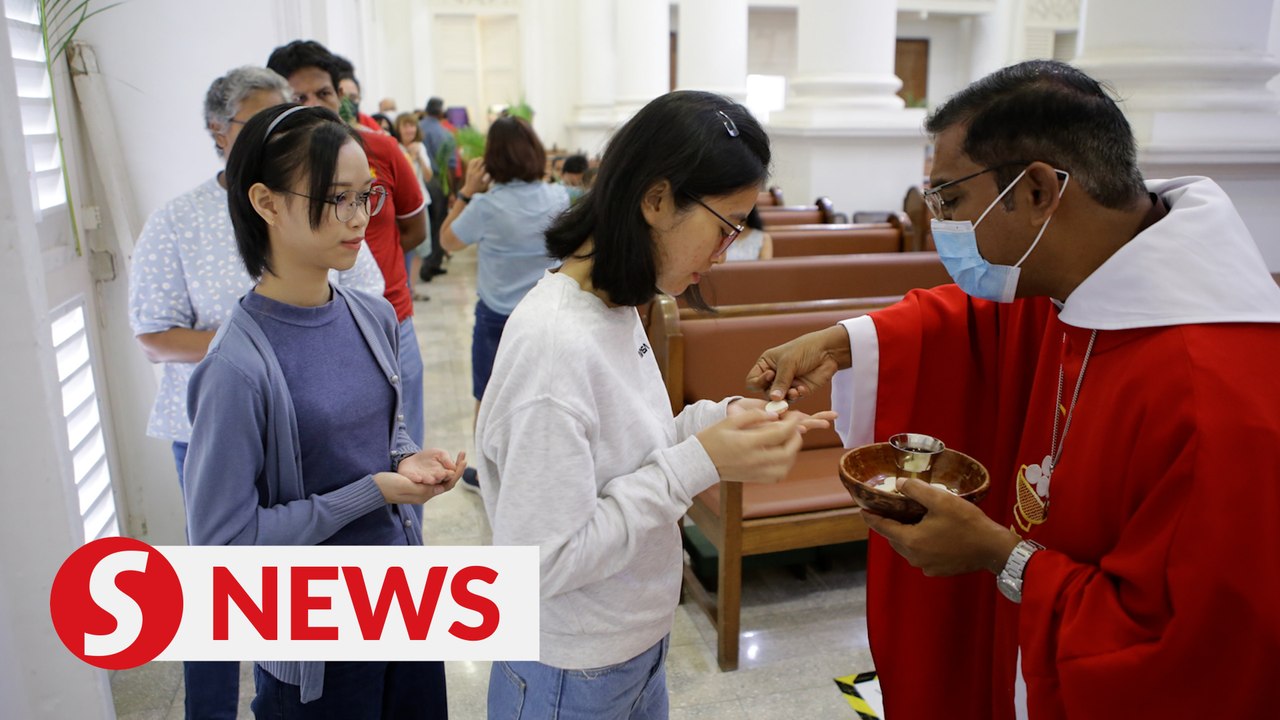 Early downpour disrupts Palm Sunday procession at Penang church