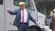Man in Trump mask ‘directs’ traffic outside Trump Tower ahead of court hearing
