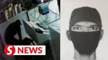 Axe-wielding burglar knocks out guard, robs phone shop in Teluk Intan
