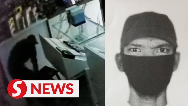 Axe-wielding burglar knocks out guard, robs phone shop in Teluk Intan