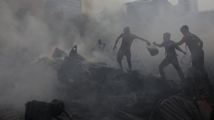 Massive fire rages through clothing market in Bangladesh capital