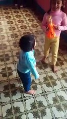 Akshu & Trishu playing with electric doll -dm