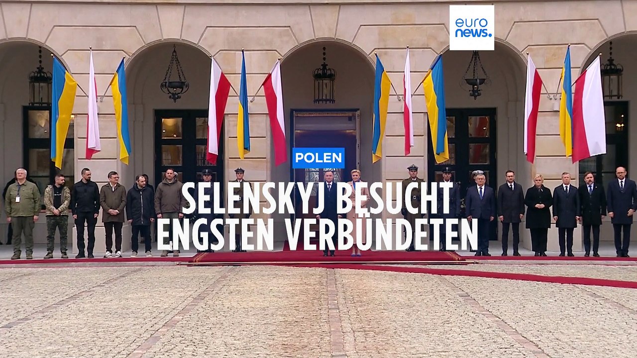 Mit Militärhose und Gattin: Selenskyj feierlich in Warschau empfangen