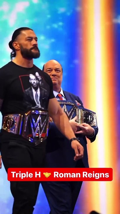 Roman Reigns handshake  with Triple H