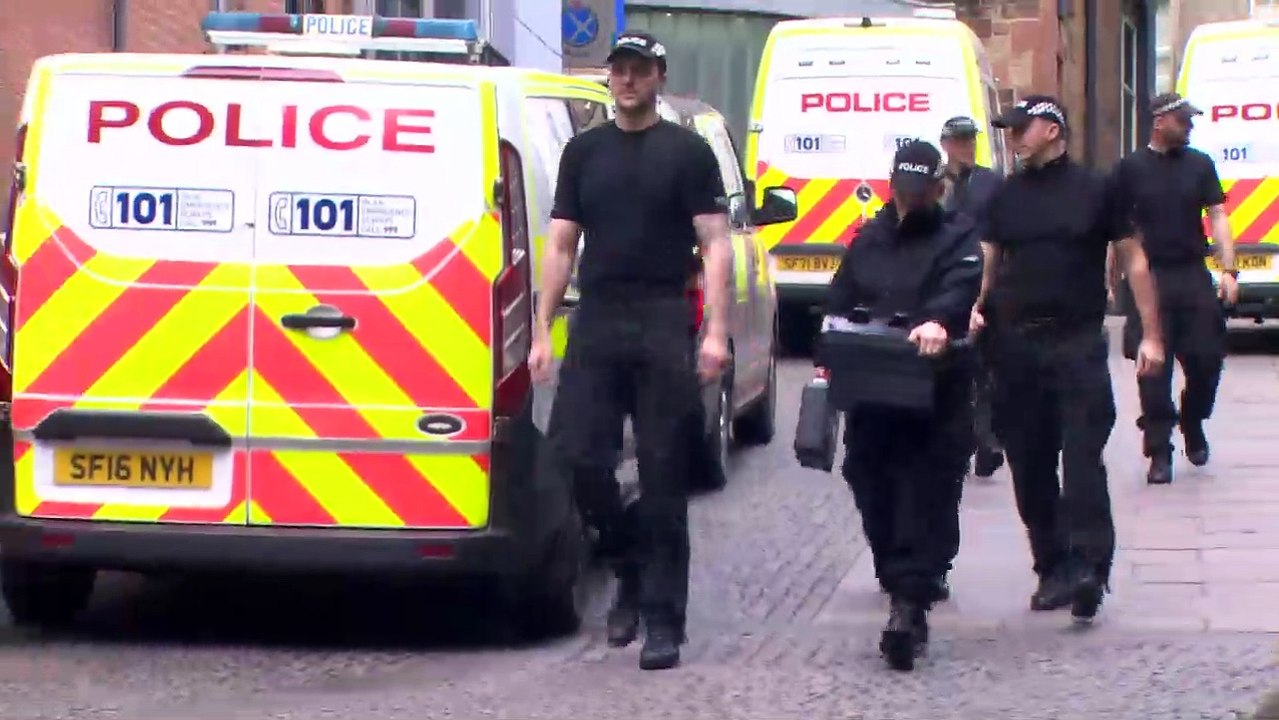 Police at the SNP HQ following the arrest of Peter Murrell