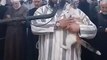 The cutest intruder intervened in Imam's Ramadan Prayer. Cat jumps on Imam's shoulder and tries to kiss him. While the Imam continued to recite the 'Taraweeh' prayer